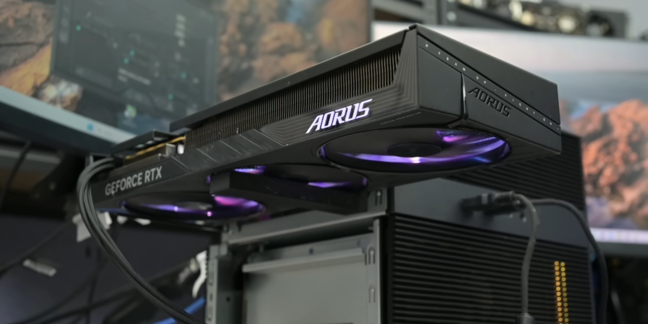 Crazed modder turns NAS into a gaming PC with RTX 5060 hanging from the side, boosts frame rate by 828% — Frankenstein rig hides dedicated PSU in drive bay, breaks Time Spy world record for the onboard CPU